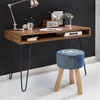 A wooden desk with a lamp, radio, and stool in a home office setting. Anteprima dell’immagine prodotto