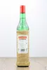 A bottle of Luxardo Maraschino liqueur on a wooden surface against a white background. Anteprima dell’immagine prodotto