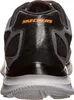 The back view of a black and gray Skechers athletic shoe. Produktbild-Vorschau