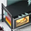 A microwave oven placed on a countertop with a shelf above it, illustrating airflow for heat dissipation. Produktbild-Vorschau