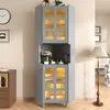 A gray corner cabinet with glass doors and internal lighting, placed in a room with a clock and a floor lamp. Produktbild-Vorschau