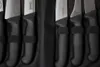 A close-up view of several knives in a black carrying case. Náhľad obrázku produktu