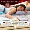 A woman sleeping on a bed, with diagrams illustrating product features. Produktbild-Vorschau