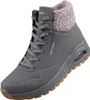 A single gray Skechers boot with a pink and gray knitted collar and a brown sole, isolated on a white background. Anteprima dell’immagine prodotto