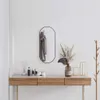 vidaXL Lustro ścienne czarne 70x30 cm owalne Podgląd zdjęcia produktu 2