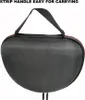 A black hard-shell case for headphones with a red zipper detail and a carrying strap. Produktbild-Vorschau