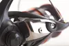 A close-up view of a fishing reel. Produktbild-Vorschau