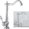 A chrome faucet with a white ceramic handle is shown against a white background. A smaller inset image shows the faucet in use, with water flowing into a white sink. Produktbild-Vorschau