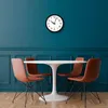 A dining set with a round table and four chairs in a room with blue walls and wood flooring. Podgląd zdjęcia produktu