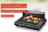 Der Unold 58565 Barbecue-Grill Vario von Unold ist ein schwarzer Elektrogrill, abgebildet mit Hähnch Produktbild-Vorschau