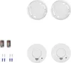 A collection of smoke detectors and their accessories, including batteries and mounting hardware, laid out on a white background. Produktbild-Vorschau