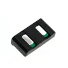 A black battery pack with two silver contacts and green battery cells, isolated on a white background. Produktbild-Vorschau