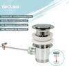 A close-up product shot of a bathroom drain assembly with descriptive text and branding. Produktbild-Vorschau
