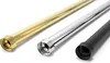 Three metal tubes of different colors and finishes are laid out diagonally on a white background. Produktbild-Vorschau