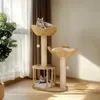 Two cats are relaxing on a multi-level cat tree in a well-lit room with natural light coming through a window. Náhľad obrázku produktu