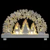 A decorative Christmas arch with reindeer and trees, illuminated from behind. Podgląd zdjęcia produktu