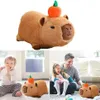 A collage showing a plush capybara toy, a baby with a bottle, and a father and daughter playing with the toy. Náhled obrázku produktu