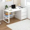 A white desk with a laptop, books, and headphones. Podgląd zdjęcia produktu