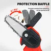 Close-up of a mini electric chainsaw with a protective baffle and sawdust flying. Anteprima dell’immagine prodotto