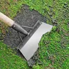 A garden hoe is being used to scrape moss off a surface. Náhľad obrázku produktu