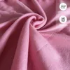 A close-up of pink fabric, likely a bedsheet, with icons and text indicating product features. Produktbild-Vorschau