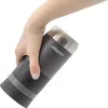 A hand holding a Contigo travel mug. Podgląd zdjęcia produktu