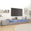 A modern living room with a TV stand and a large television mounted on the wall. Náhled obrázku produktu