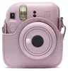 A pink Instax Mini 12 camera with a pink leather case. Náhľad obrázku produktu