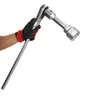 A hand wearing a glove holds a large socket wrench. Produktbild-Vorschau
