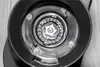 Close-up view of the burr grinder mechanism of a coffee grinder. Anteprima dell’immagine prodotto