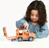 A young girl playing with a toy car and trailer. Náhľad obrázku produktu