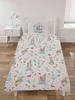 A Peter Rabbit themed duvet cover and pillowcase set laid out on a single bed. Voir les images du produit