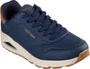 A single navy blue Skechers sneaker is shown from a slightly elevated side angle against a white background. Voir les images du produit