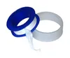 A roll of white Teflon tape with a blue plastic spool and a separate white ring of tape. Podgląd zdjęcia produktu