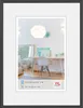 A framed picture of a desk area with a chair and a lamp. Anteprima dell’immagine prodotto