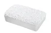 A white granular block, likely a dehumidifier refill, is shown against a white background. Produktbild-Vorschau