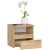 A wooden nightstand with an open drawer, a white vase with a white orchid on top, and a remote control. Produktbild-Vorschau