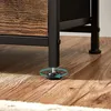 A close-up of the adjustable foot of a piece of furniture. Náhled obrázku produktu