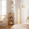 A cozy and organized corner of a bedroom with a desk, shelves, and a bed. Produktbild-Vorschau