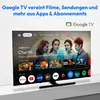 A television screen displaying the Google TV interface with various app icons and content previews. Produktbild-Vorschau