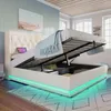 A bedroom scene with a white bed frame open to reveal storage space, a tablet on the headboard, and LED lighting around the base. Voir les images du produit