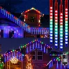 A collage of images showing houses decorated with colorful LED icicle lights at night. Náhled obrázku produktu