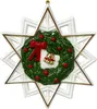 A Christmas ornament shaped like a star with a wreath in the center. Náhľad obrázku produktu