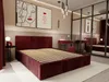 A bedroom scene with a bed, vanity, and artwork. Produktbild-Vorschau