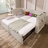A modern living room setting with a modular sofa bed, featuring integrated charging ports and storage. Anteprima dell’immagine prodotto