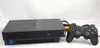 A black Sony PlayStation 2 console with a black controller, set against a white background. Produktbild-Vorschau