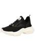 A single black sneaker with a white sole against a white background.