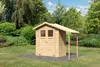 A wooden garden shed with an attached canopy sits on a paved base in a grassy yard with trees and bushes in the background. Produktbild-Vorschau
