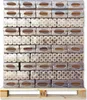A pallet stacked high with packages of wood briquettes. Produktbild-Vorschau