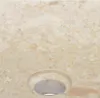 A close-up view of a marble sink with a drain hole. Náhľad obrázku produktu